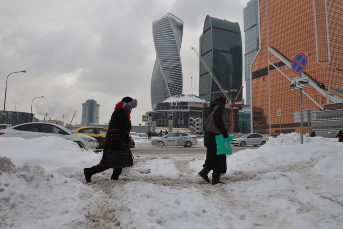 Небольшой снег и ослабление морозов ожидается в Москве 21 декабря, фото